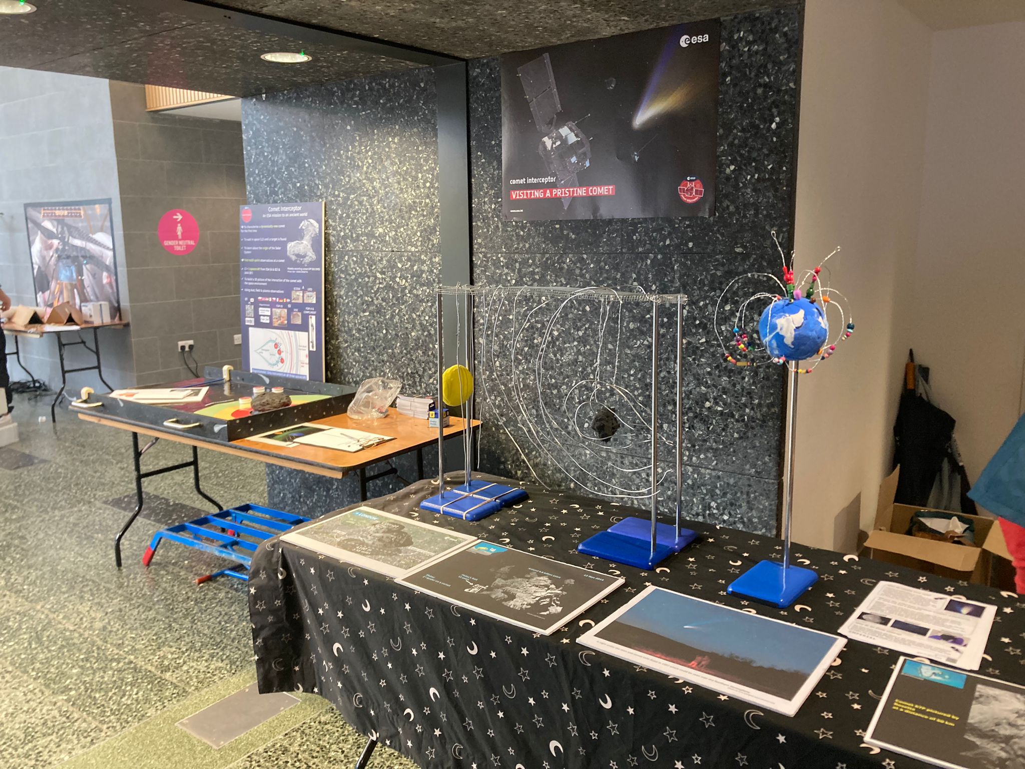 A stand with information about comets and space weather